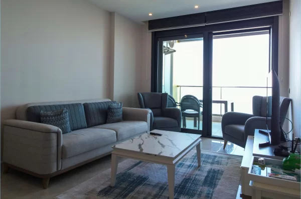 Beachfront Bliss: полностью меблированные апартаменты 1+1 с захватывающим видом на океан