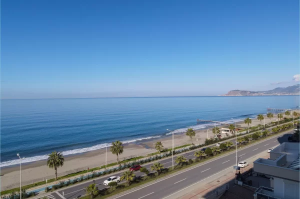 Beachfront Bliss: полностью меблированные апартаменты 1+1 с захватывающим видом на океан