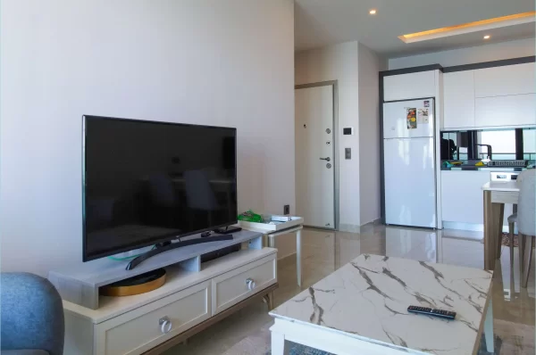 Beachfront Bliss: полностью меблированные апартаменты 1+1 с захватывающим видом на океан