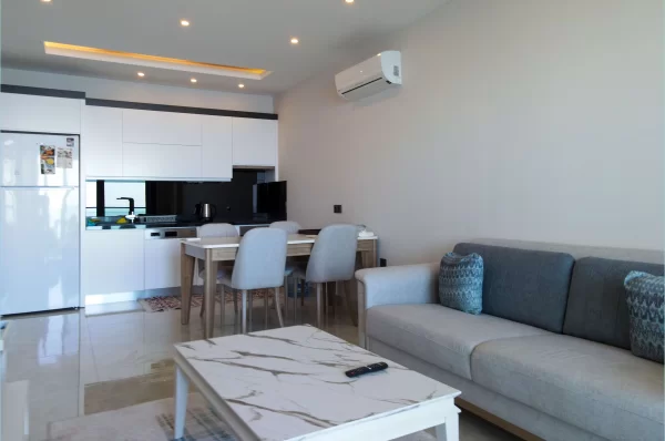 Beachfront Bliss: полностью меблированные апартаменты 1+1 с захватывающим видом на океан