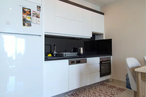 Beachfront Bliss: полностью меблированные апартаменты 1+1 с захватывающим видом на океан