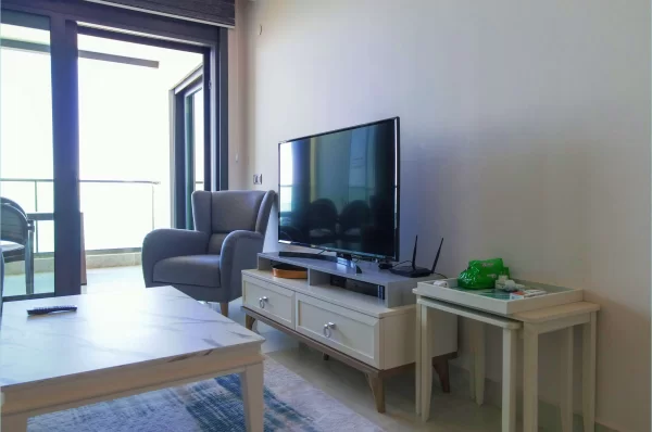 Beachfront Bliss: полностью меблированные апартаменты 1+1 с захватывающим видом на океан