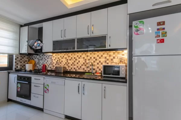 Contemporary Building Meets Comfort: Stylish 1+1 Property in Mahmutlar, Alanya