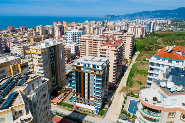 Contemporary Building Meets Comfort: Stylish 1+1 Property in Mahmutlar, Alanya