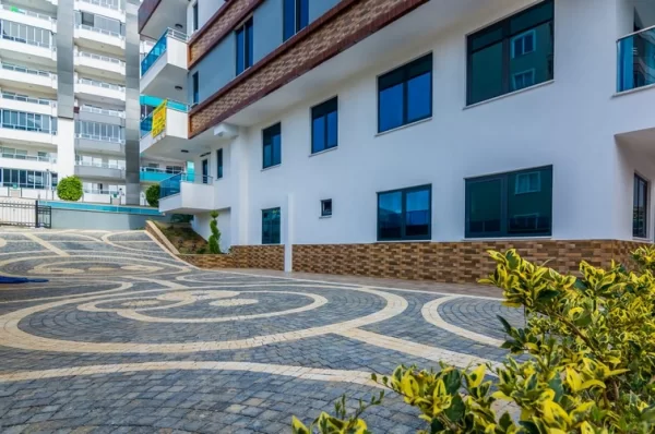Contemporary Building Meets Comfort: Stylish 1+1 Property in Mahmutlar, Alanya