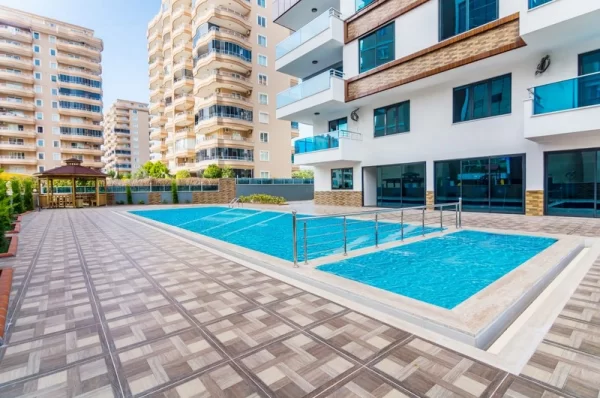 Contemporary Building Meets Comfort: Stylish 1+1 Property in Mahmutlar, Alanya