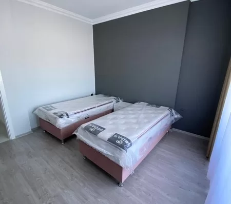 Furnished 4 + 1 Duplex Apartment with a Pool and a Charming Sea View