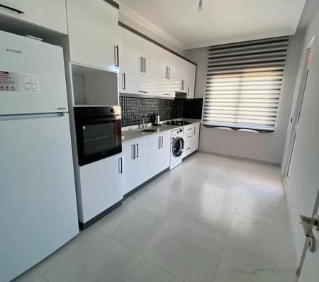 Furnished 4 + 1 Duplex Apartment with a Pool and a Charming Sea View