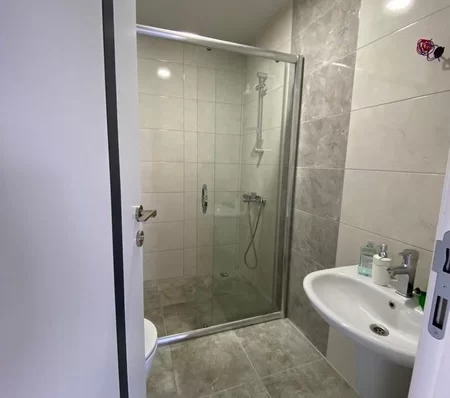 Furnished 4 + 1 Duplex Apartment with a Pool and a Charming Sea View