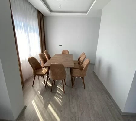 Furnished 4 + 1 Duplex Apartment with a Pool and a Charming Sea View