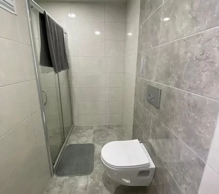 Furnished 4 + 1 Duplex Apartment with a Pool and a Charming Sea View