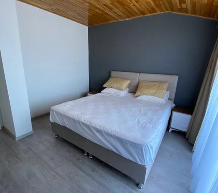 Furnished 4 + 1 Duplex Apartment with a Pool and a Charming Sea View