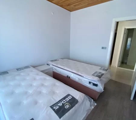 Furnished 4 + 1 Duplex Apartment with a Pool and a Charming Sea View