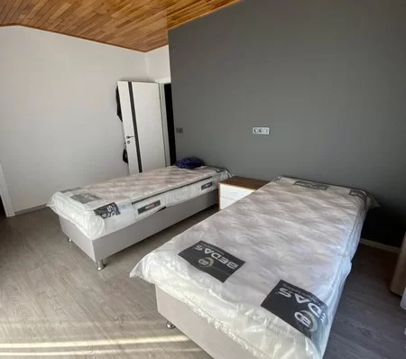 Furnished 4 + 1 Duplex Apartment with a Pool and a Charming Sea View