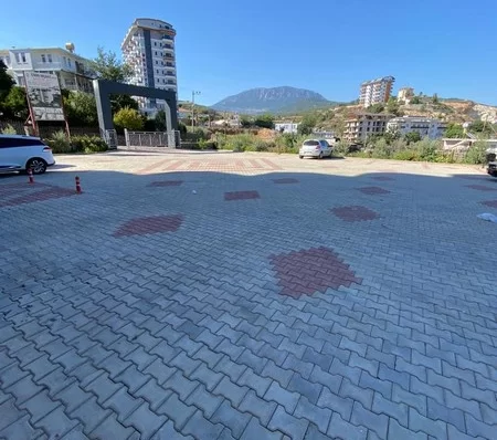 Furnished 4 + 1 Duplex Apartment with a Pool and a Charming Sea View