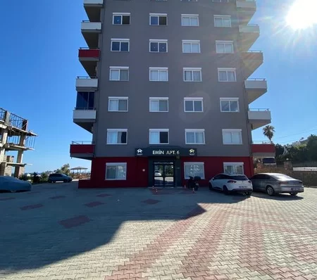 Furnished 4 + 1 Duplex Apartment with a Pool and a Charming Sea View