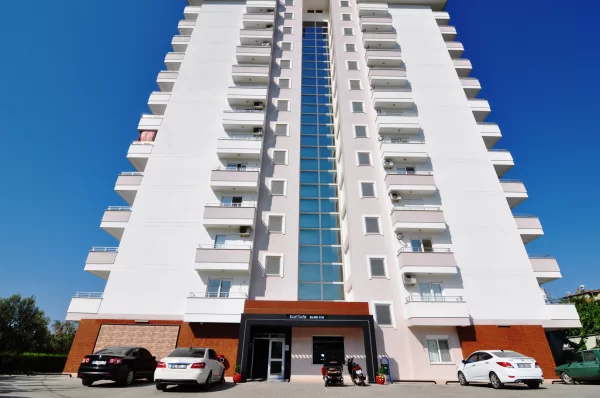 Новый просторные апартаменты 1+1 площадью 60 кв.м. в 500 метрах от моря в Алании